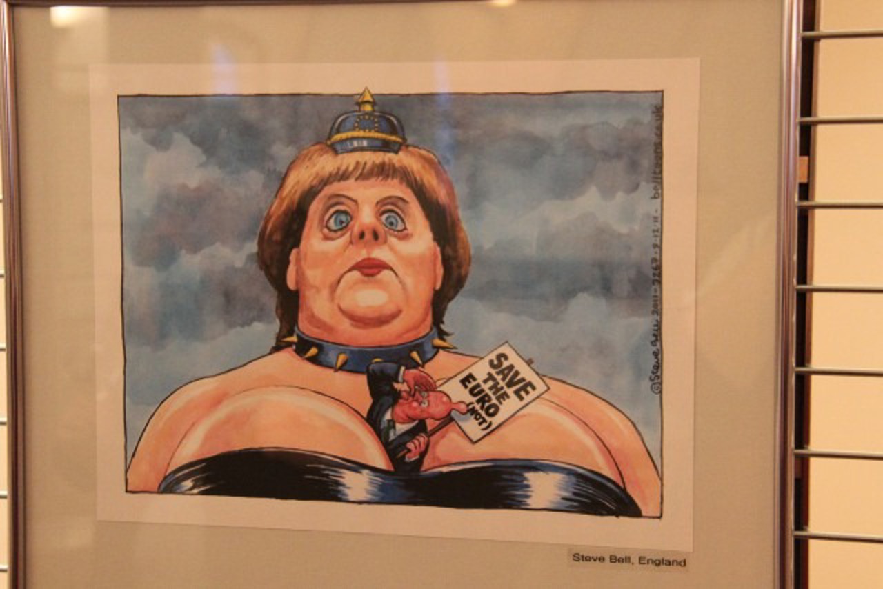 Englische Karikatur mit Angela Merkel