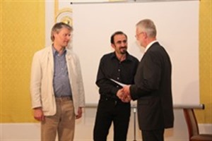 Michael Hugo und Adnan Harb, migra e.V. und Prof. Dr. Carl Thümecke